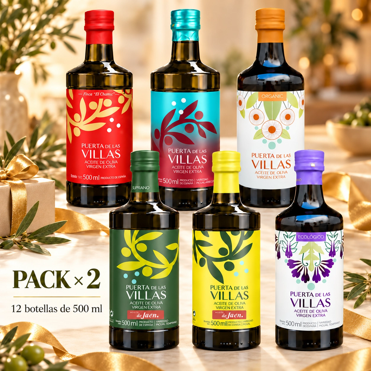 Pack regalo AOVE doble Puerta de Las Villas con seis referencias, cintas doradas y un regalo decorativo.